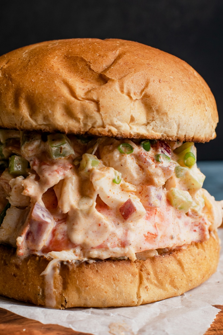This healthy New England Lobster Roll is overflowing with comfort food ingredients such as fresh lobster, greek yogurt, lemon juice, lemon zest, and olive oil